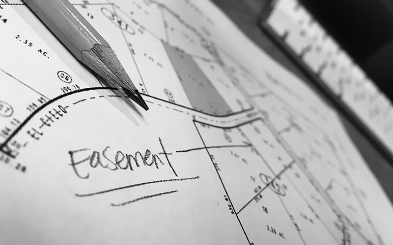 Easement plans on suburban property diagrams.